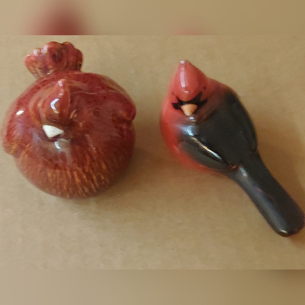 Red and Black Bird Figurines